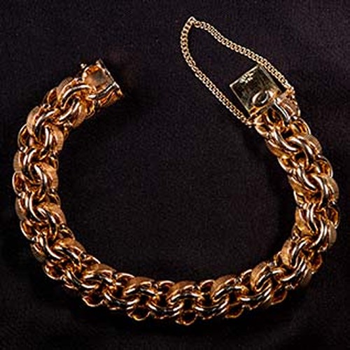 14 Kt Heavy Charm Bracelet