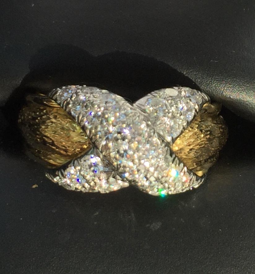a classic Tiffany 18 Kt Vintage Schlumberger ring with a full Carat of diamonds set in platinum